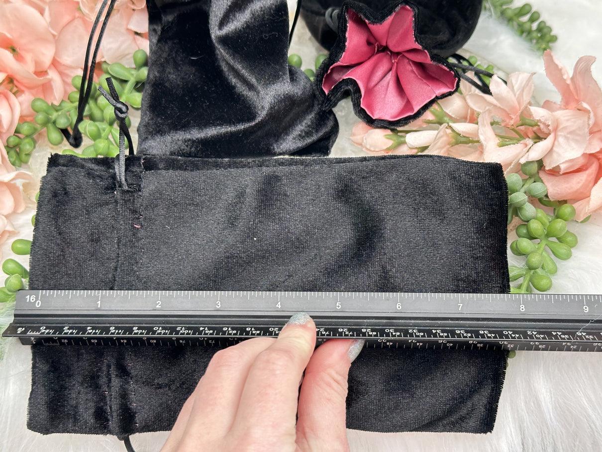 pink black drawstring bag