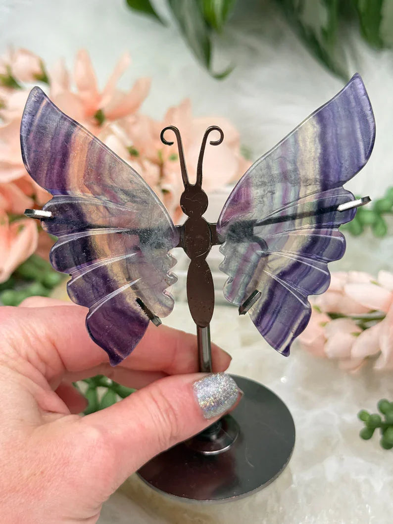 purple-green-fluorite-butterfly-crystals-on-metal-stand