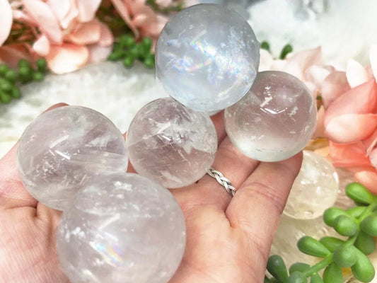 Small-Clear-Optical-Calcite-Crystal-Spheres-with-Rainbows