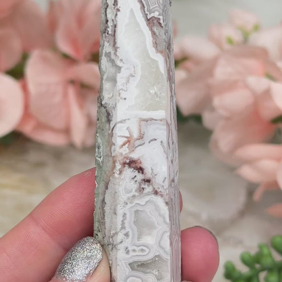 crazy-lace-agate-point-with-quartz-pockets