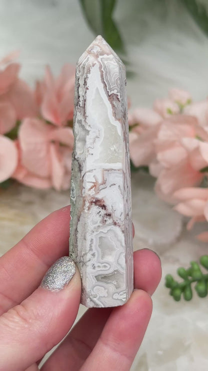 crazy-lace-agate-point-with-quartz-pockets