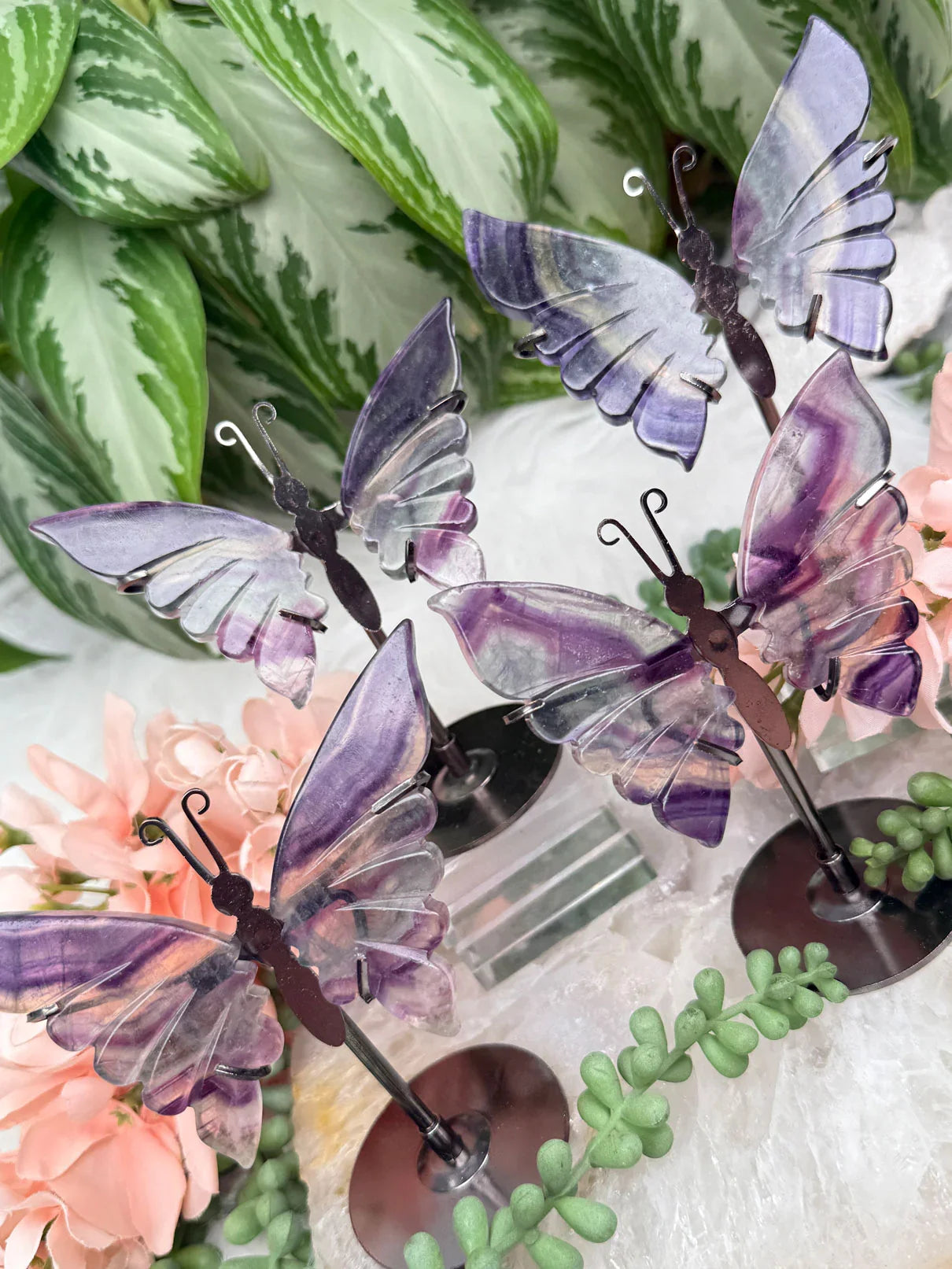 purple-green-fluorite-butterfly-crystals-on-metal-stand
