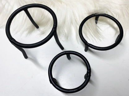 These simple black metal sphere stands are perfect for holding your favorite spheres or eggs. 