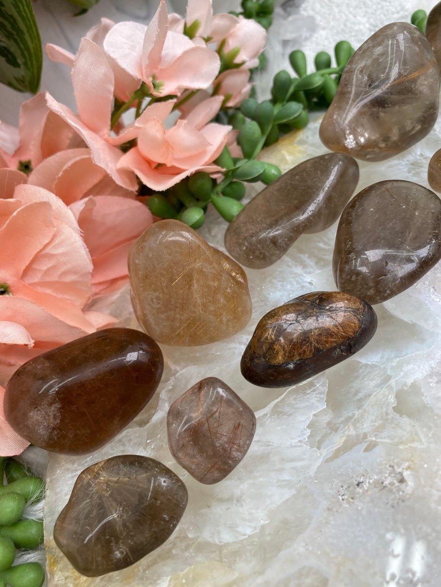 Tumbled-Brazil-Rutile-in-Smoky-Quartz-Crystal-Stones