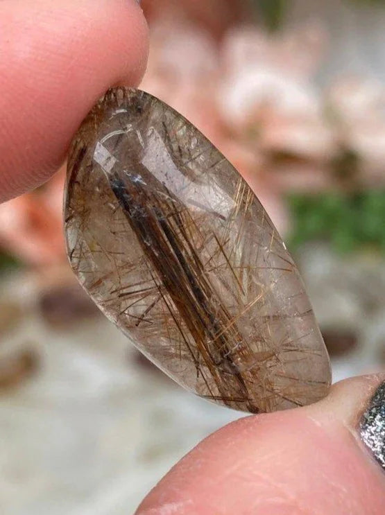Tumbled-Brown-Red-Rutile-in-Quartz-Stone