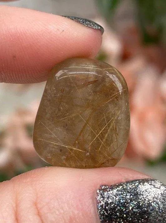 Tumbled-Golden-Rutile-in-Quartz