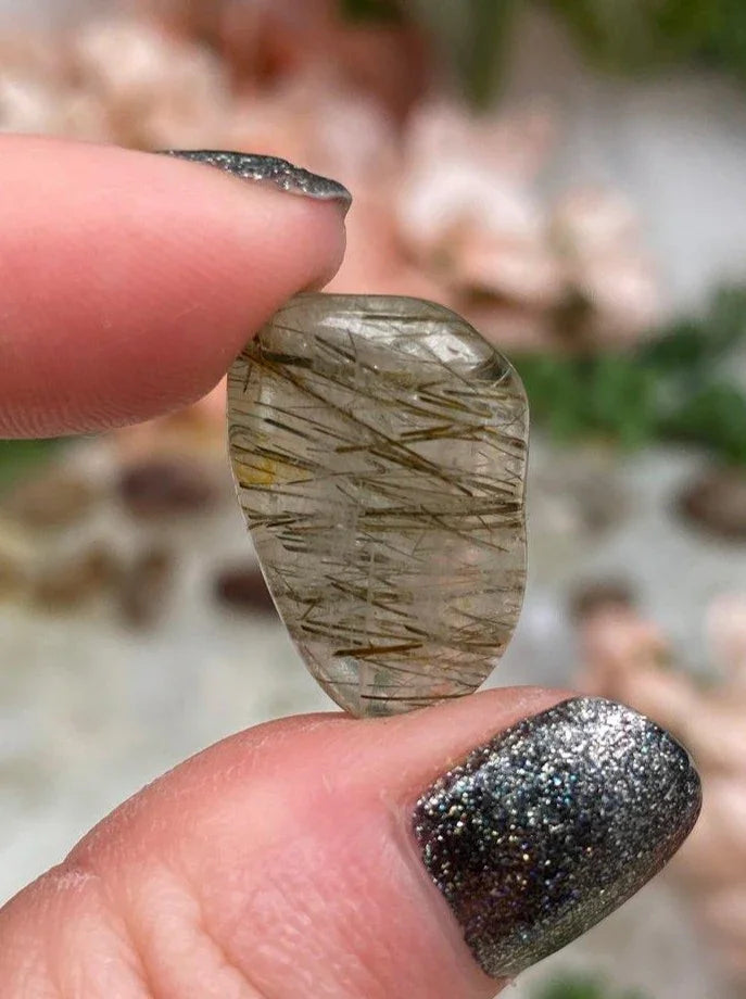 Tumbled-Green-Brown-Rutile-in-Clear-Quartz