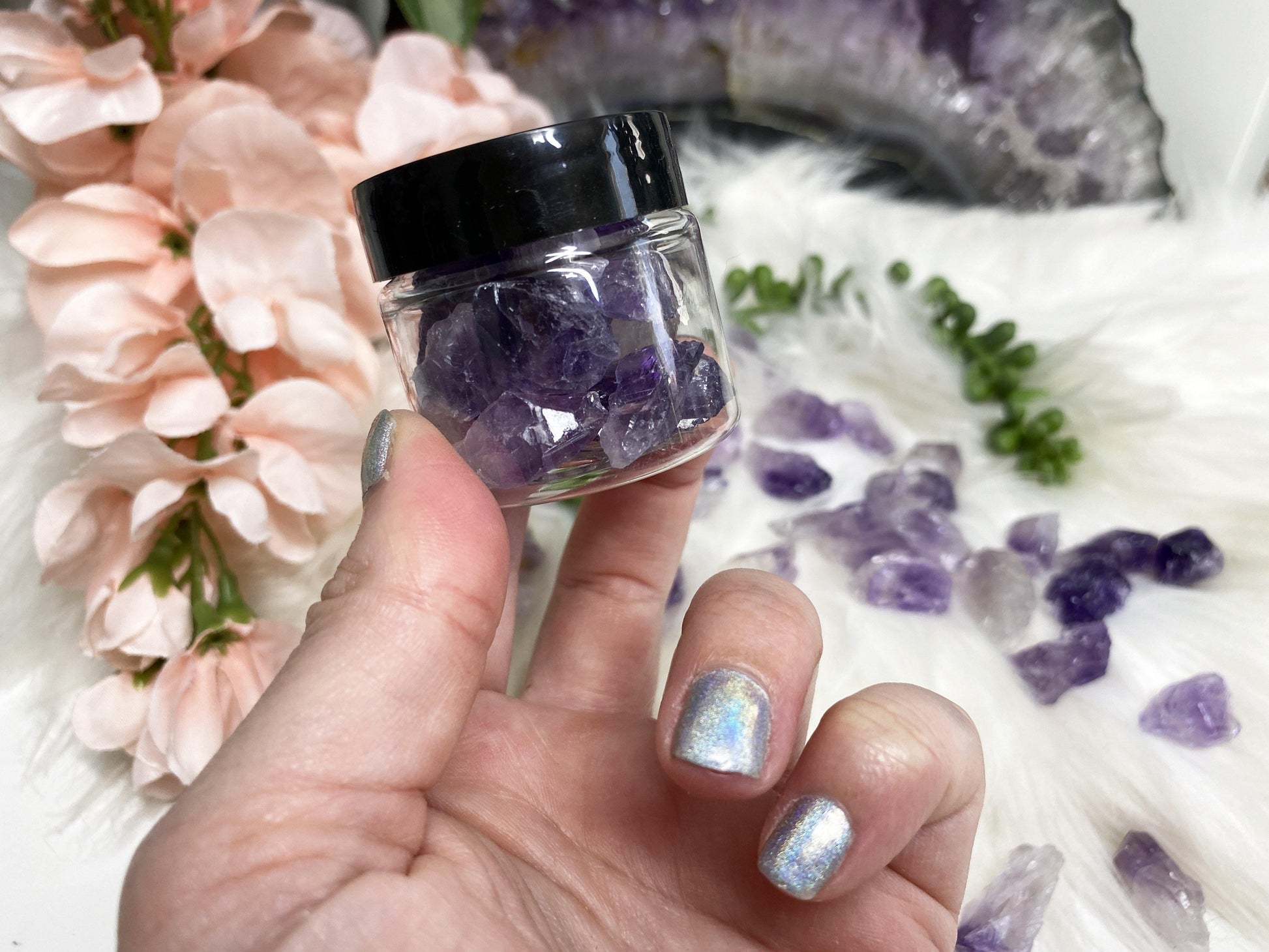 An adorable jar of amethyst points and pieces