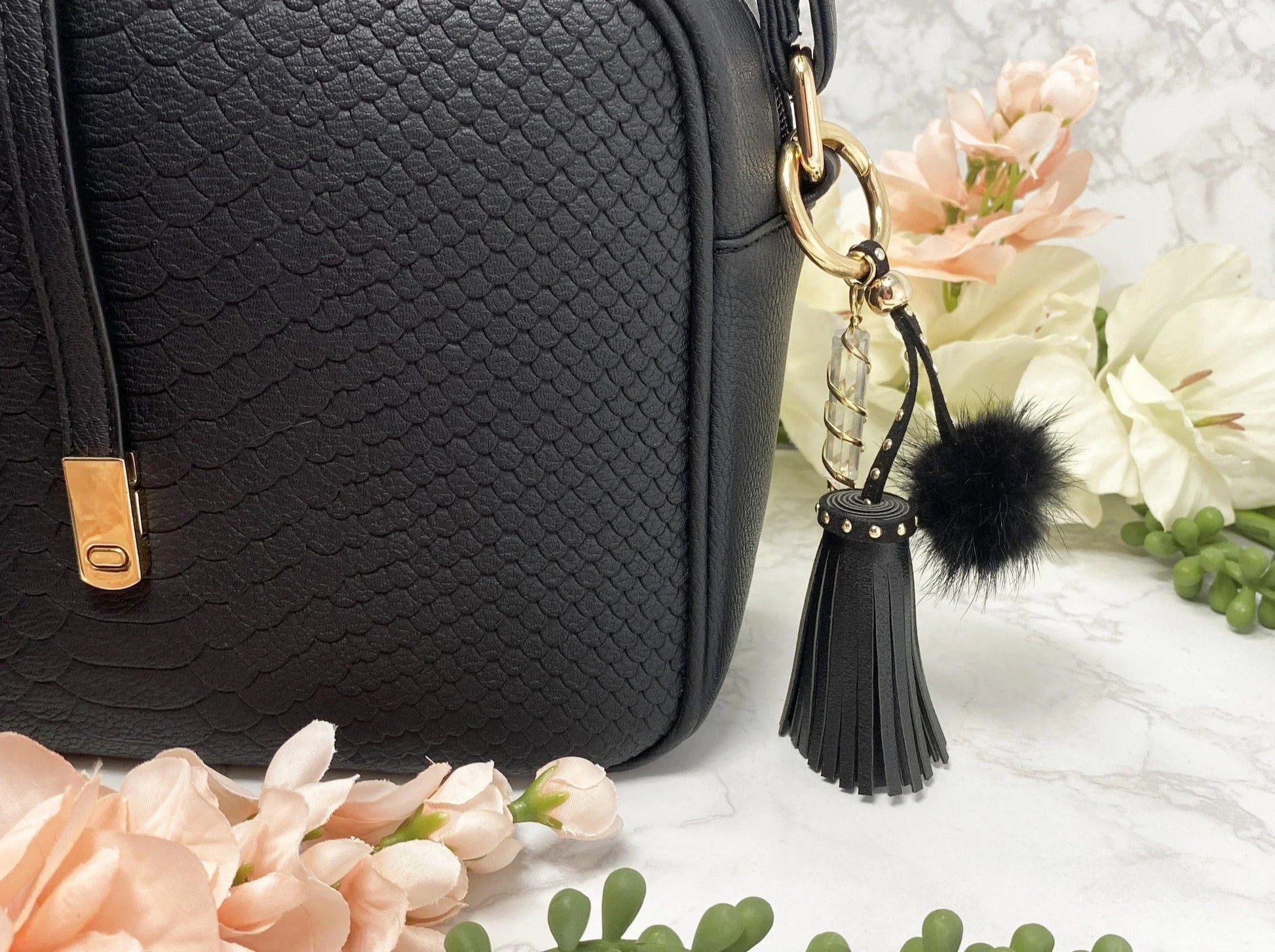 Carry your protective energies with you in style with this fashionable Quartz keychain! Made of vegan leather and vegan fur with little gold colored metal accents (gray has some silver accents)