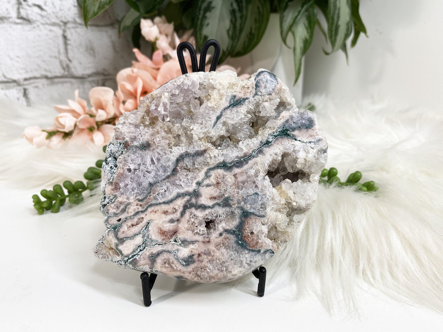 Easel metal display stands. These simple metal stands are perfect for propping up slabs or display crystals that usually just sit flat.