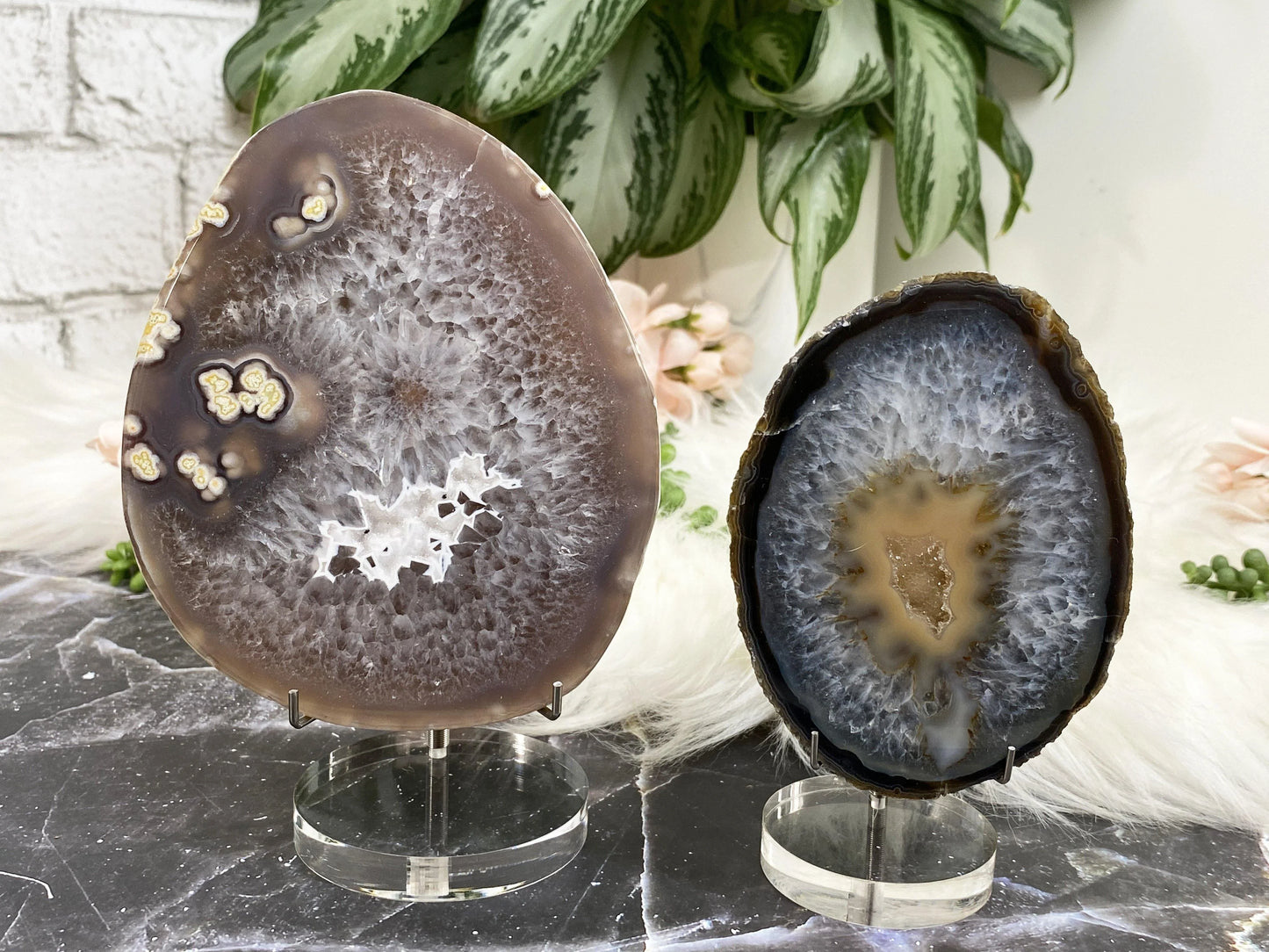 These simple acrylic and metal stands are perfect for showcasing your favorite pieces, especially ones that might sit a little wonky on the bottom.  They can also hold hearts that are about 2" in size and up