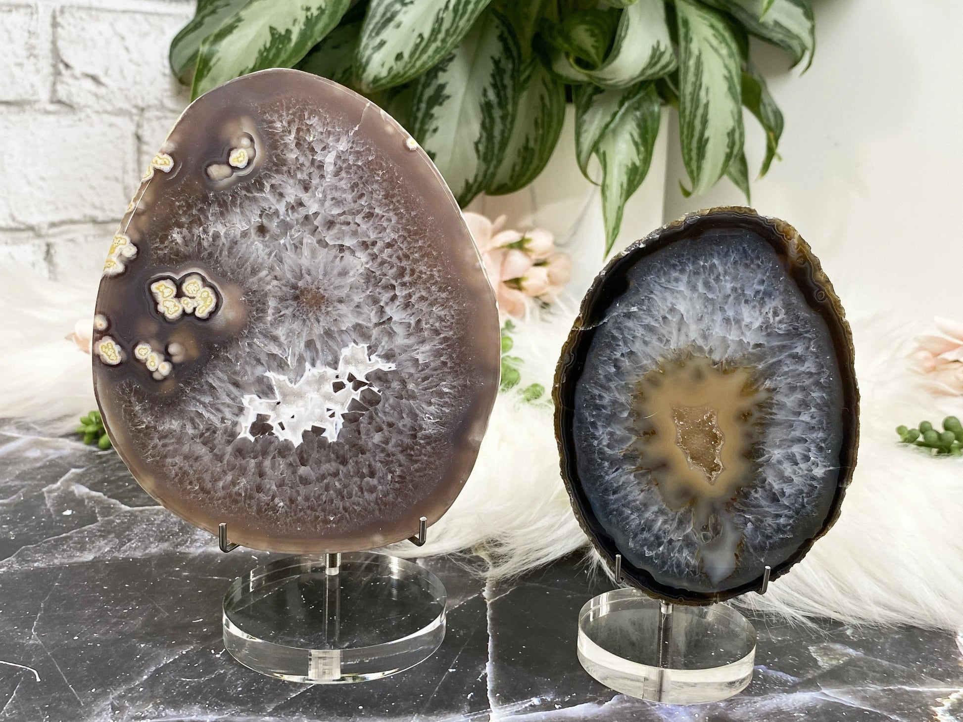 These simple acrylic and metal stands are perfect for showcasing your favorite pieces, especially ones that might sit a little wonky on the bottom.  They can also hold hearts that are about 2" in size and up