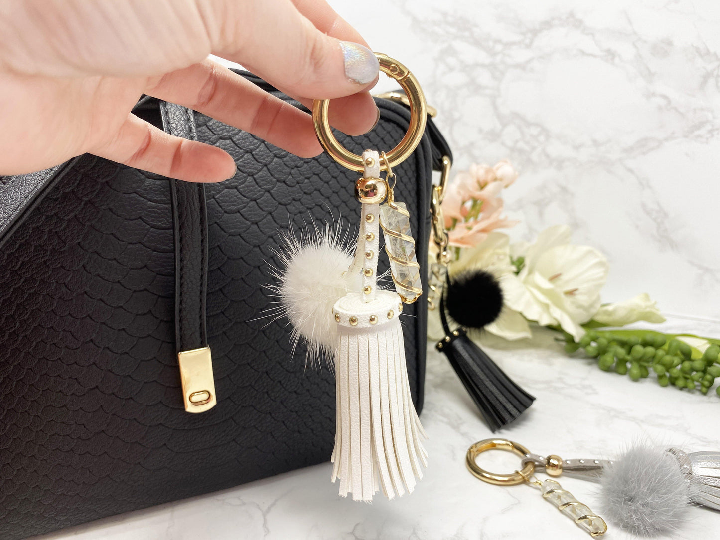 Carry your protective energies with you in style with this fashionable Quartz keychain! Made of vegan leather and vegan fur with little gold colored metal accents (gray has some silver accents)