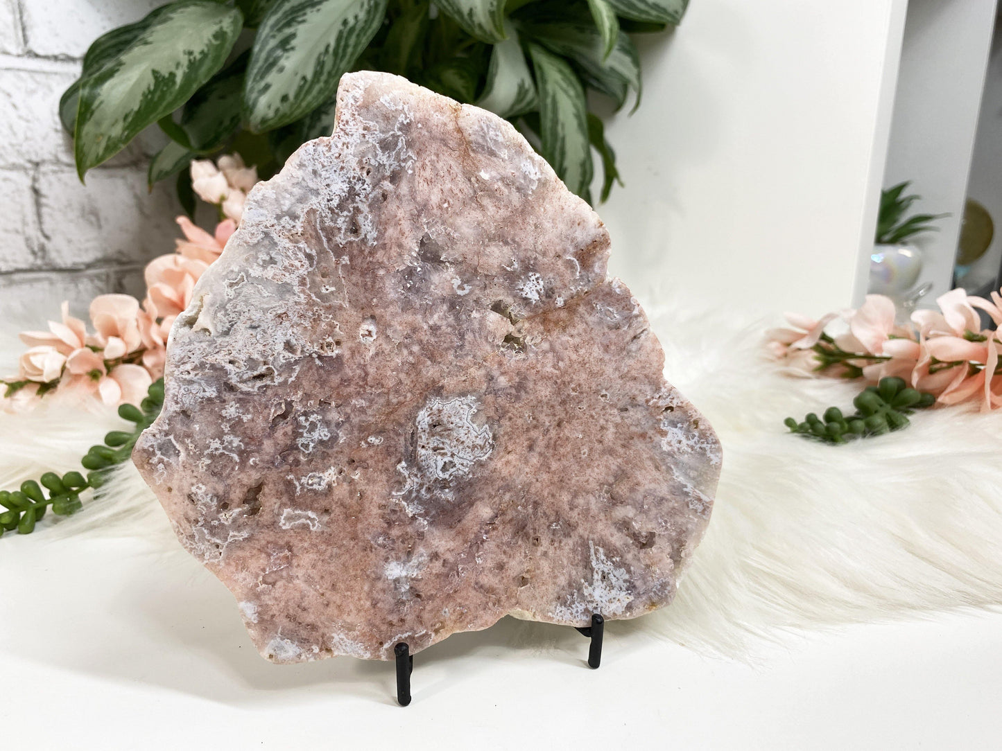 Easel metal display stands. These simple metal stands are perfect for propping up slabs or display crystals that usually just sit flat.