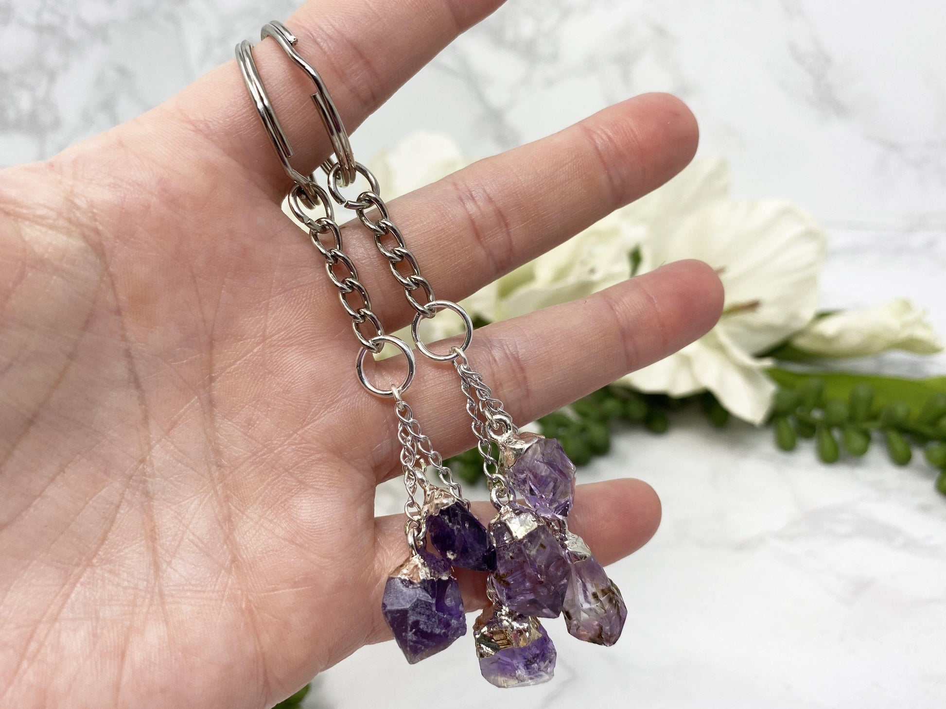 Amethyst crystal point keychains.