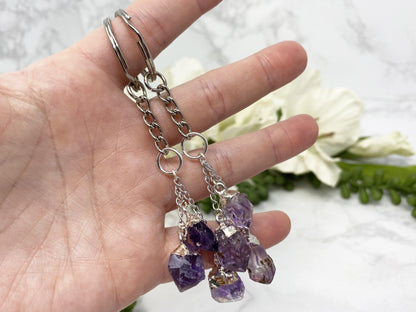 Amethyst crystal point keychains.