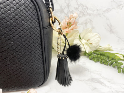 Carry your protective energies with you in style with this fashionable Quartz keychain! Made of vegan leather and vegan fur with little gold colored metal accents (gray has some silver accents)