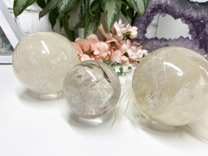 Large clear quartz crystal spheres with hints of inclusions! 