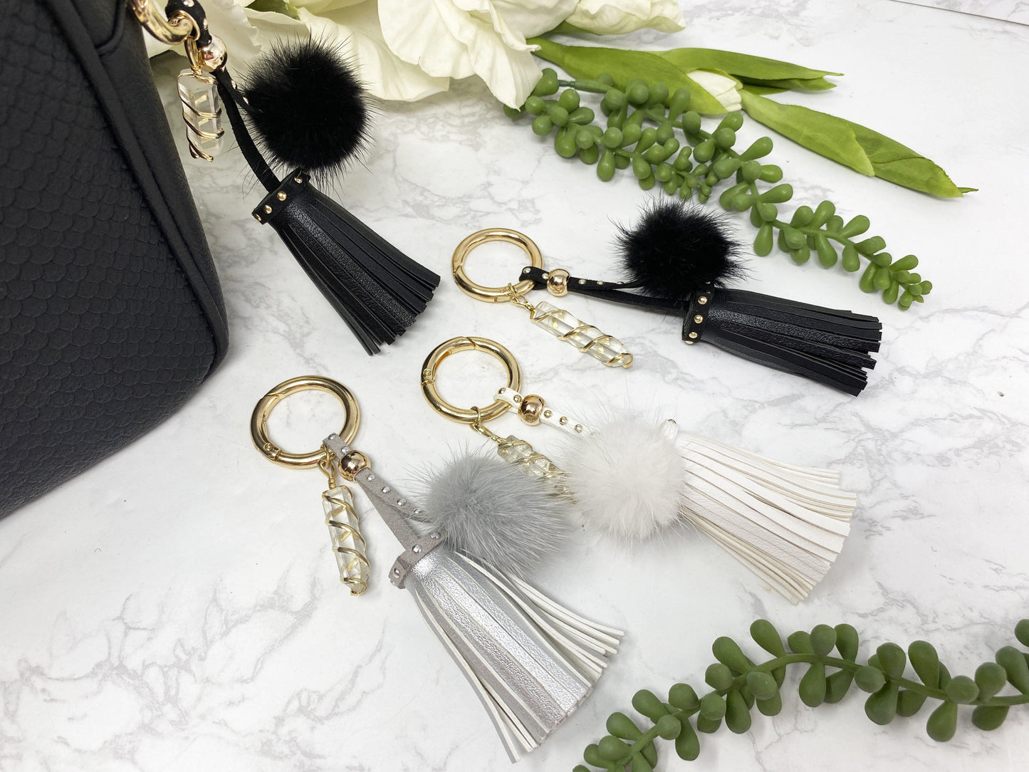Carry your protective energies with you in style with this fashionable Quartz keychain! Made of vegan leather and vegan fur with little gold colored metal accents (gray has some silver accents)