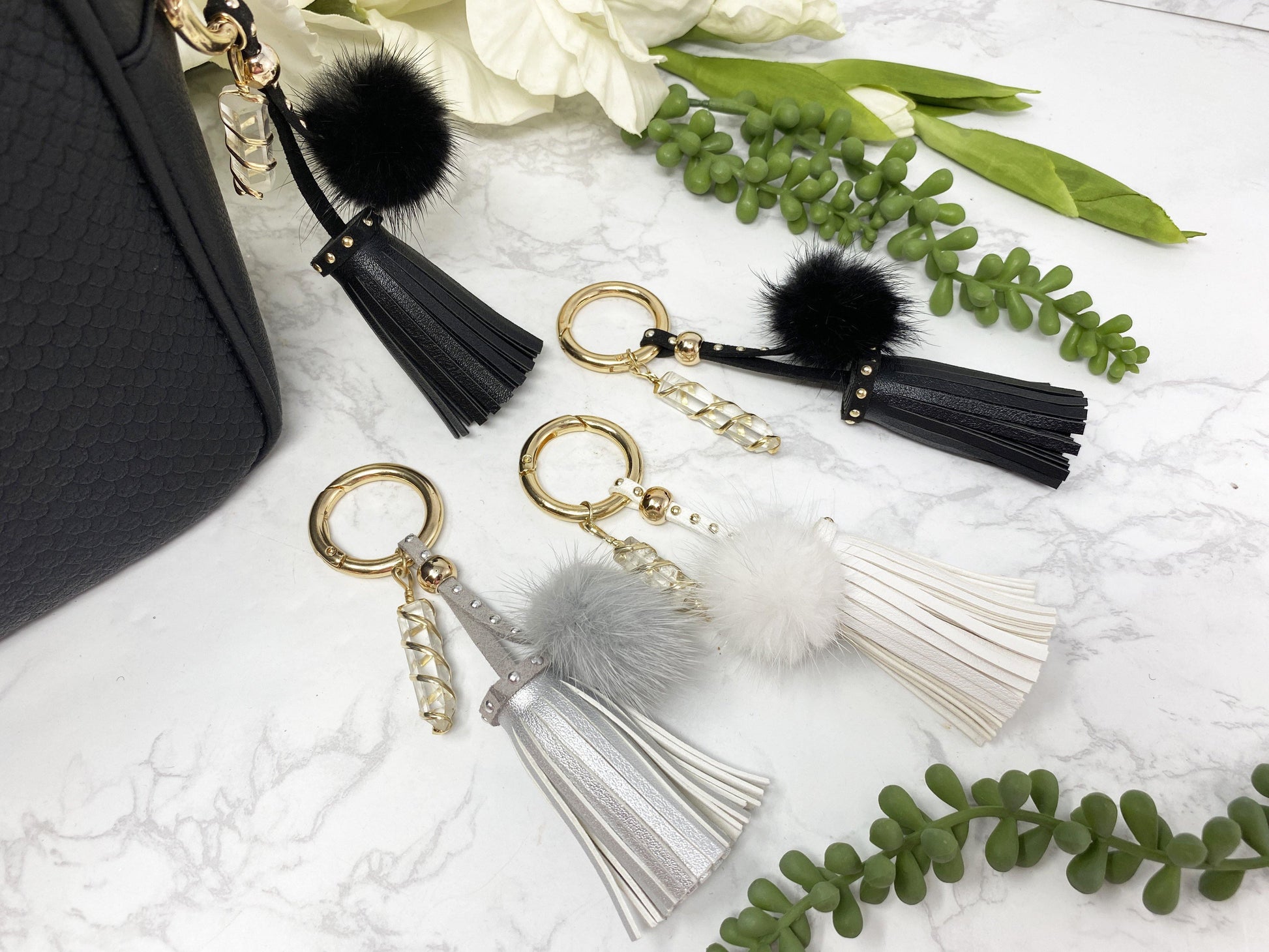 Carry your protective energies with you in style with this fashionable Quartz keychain! Made of vegan leather and vegan fur with little gold colored metal accents (gray has some silver accents)