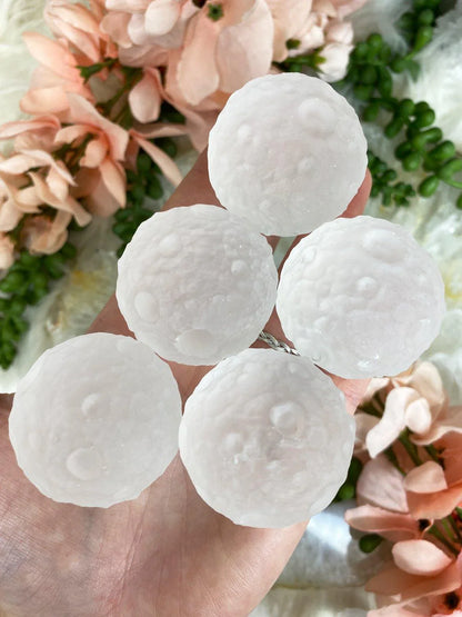 Milky-Aura-Quartz-Crystal-Sphere-Carved-Like-Moon-Surface