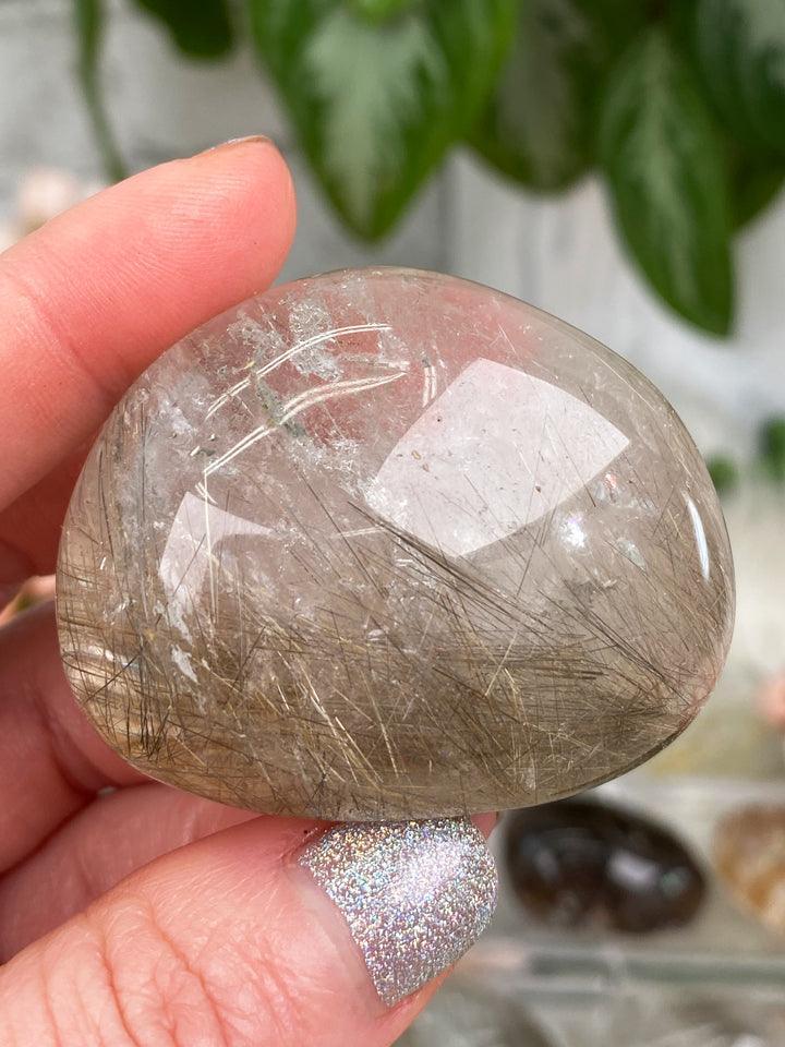 gold-rutilated-quartz-lens