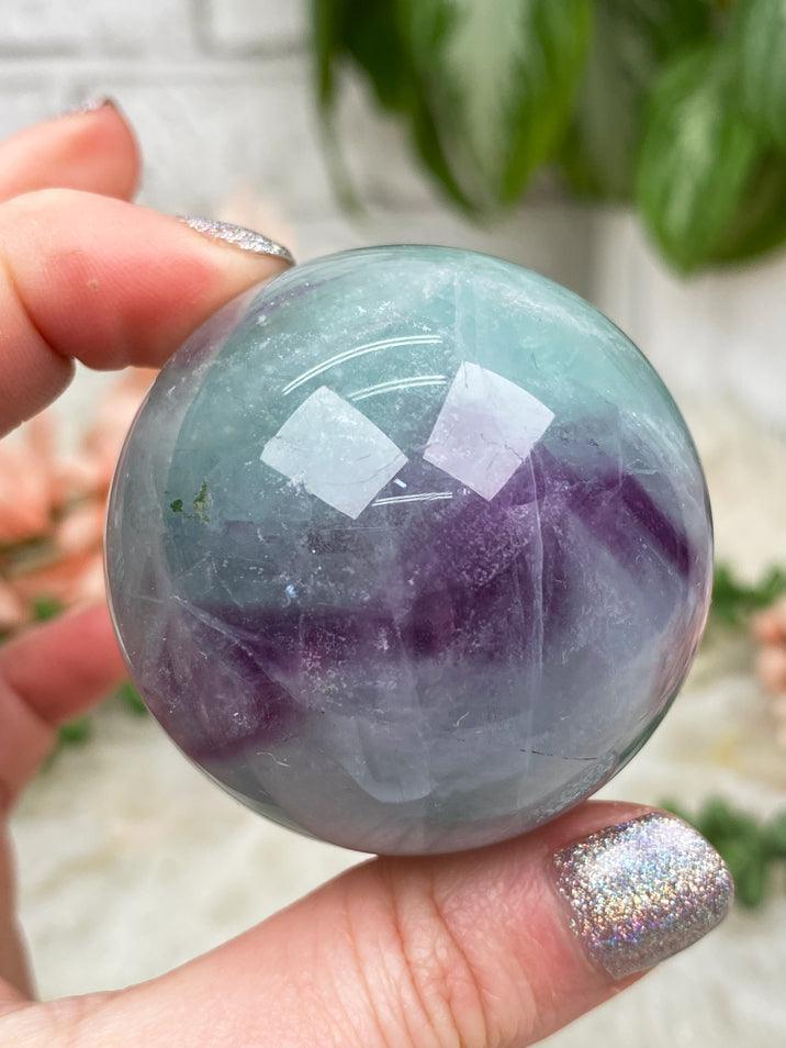 green-purple-fluorite-sphere