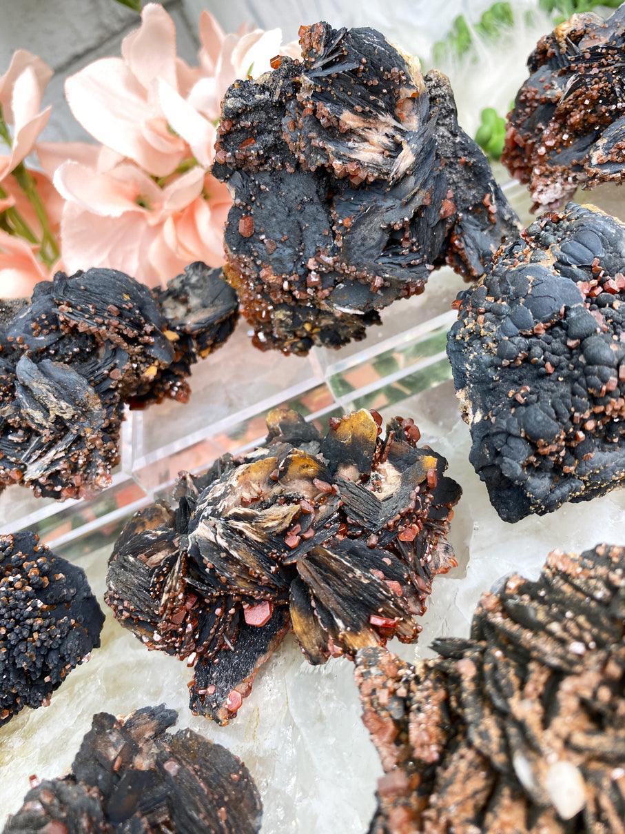 orange-vanadinite-on-black-baryte