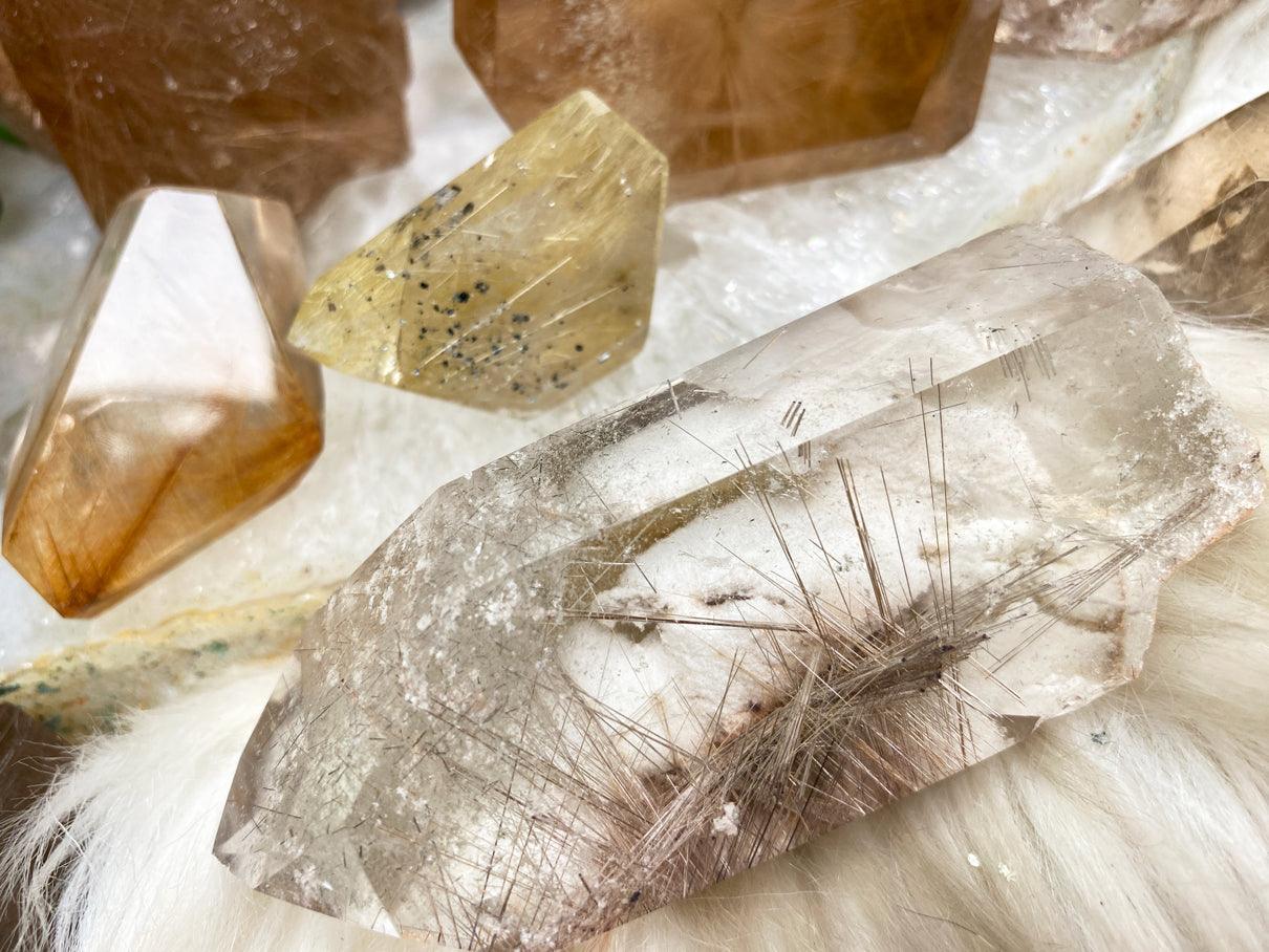 rutile-quartz-point-with-white-garden