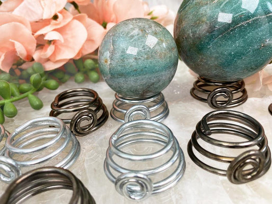 silver-bronze-twist-metal-sphere-stand