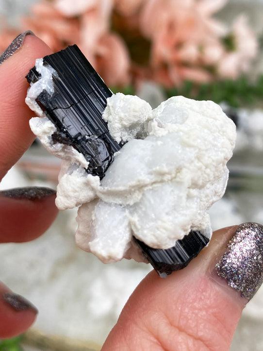 white-albite-around-black-tourmaline-rod
